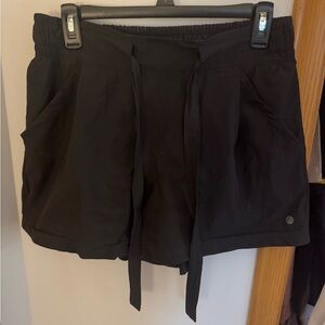 Black aesthetic shorts with strings.